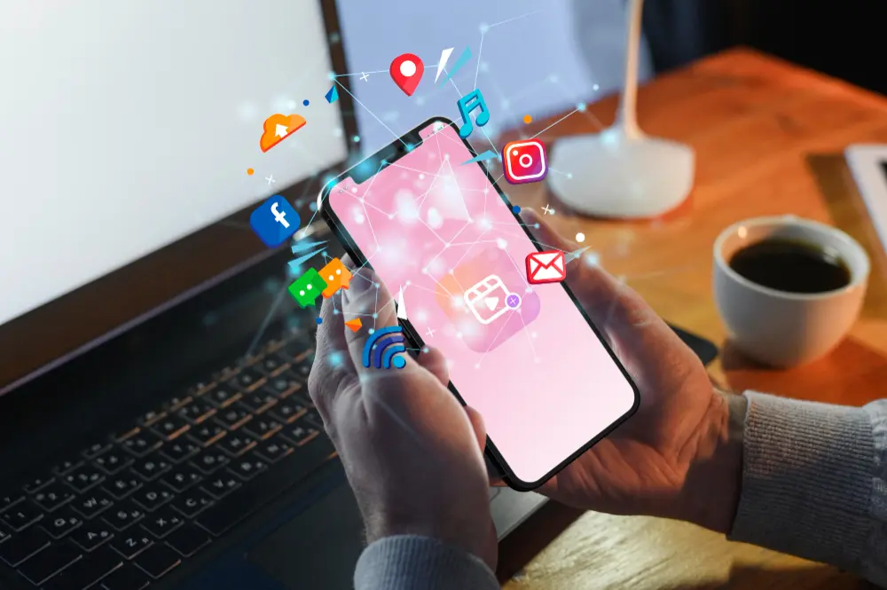 Social media marketing on a smartphone with Instagram, Facebook, messaging, email, and mobile engagement icons social media marketing agency